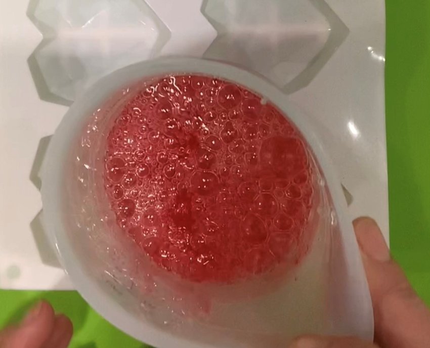 Heat up isomalt in silicone cup using microwave (heat 30 seconds, then continue in 15-second intervals until isomalt melts).